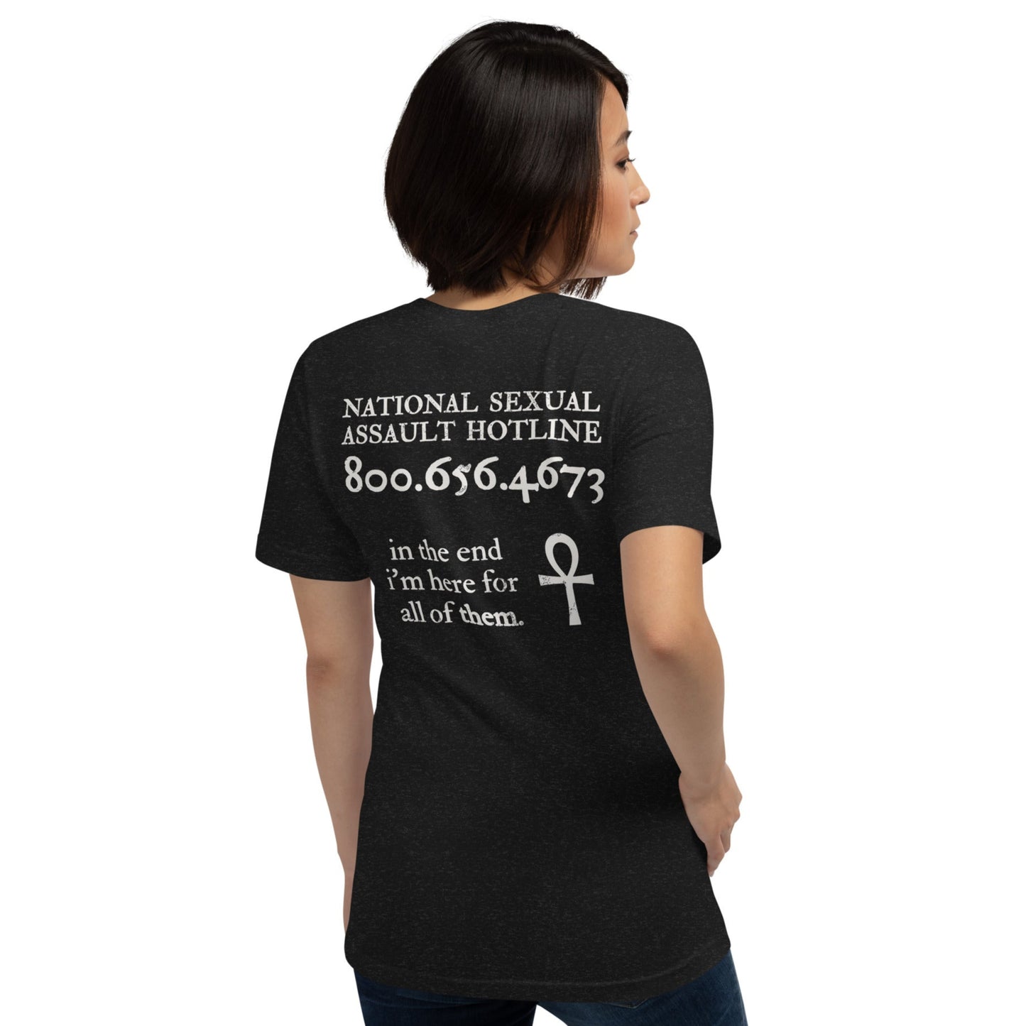Female model wearing Trust the Story t-shirt — back view with Death quote and hotline number.