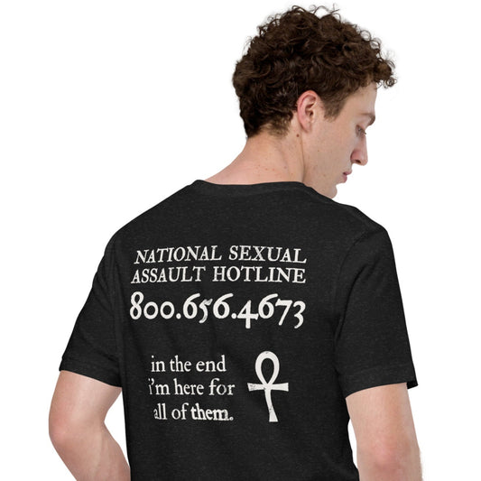 Male model wearing Trust the Story t-shirt — back view with Death quote and hotline design.